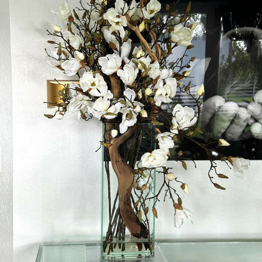 Vase with white magnolias in a modern house 50 cm high