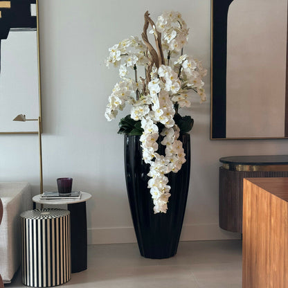 Glossy black San José vase with white orchid cascade