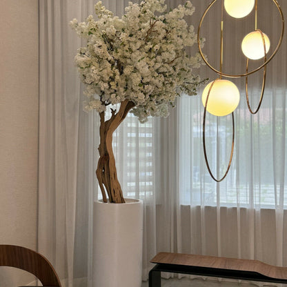 Matte beige Saint-Tropez vase with white cherry blossoms