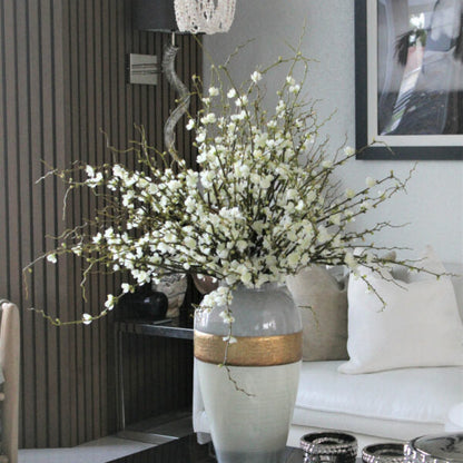Goddess vase with cherry blossom branches