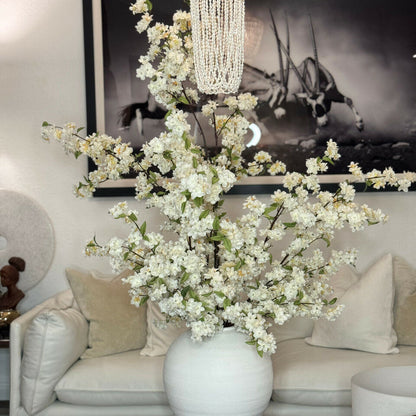 Konos vase with cherry blossoms